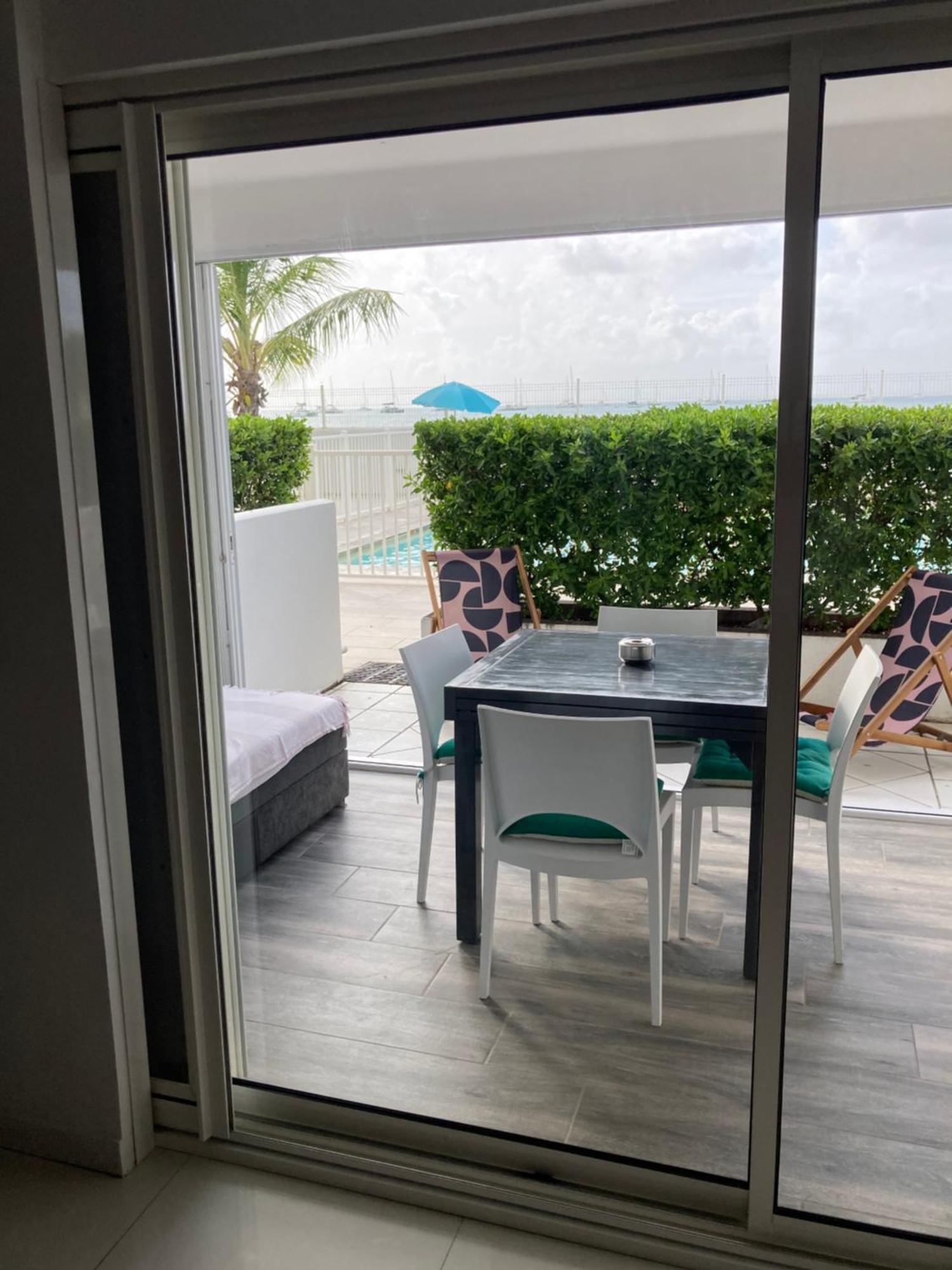 Appartement PIEDS DANS L'EAU VUE MER ACCES PLAGE ET PISCINE Marigot  Exterior foto